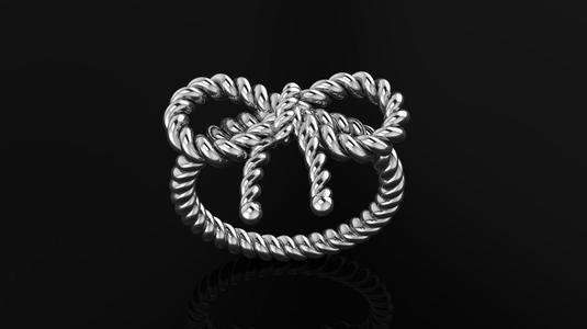 Braided twisted knot ring