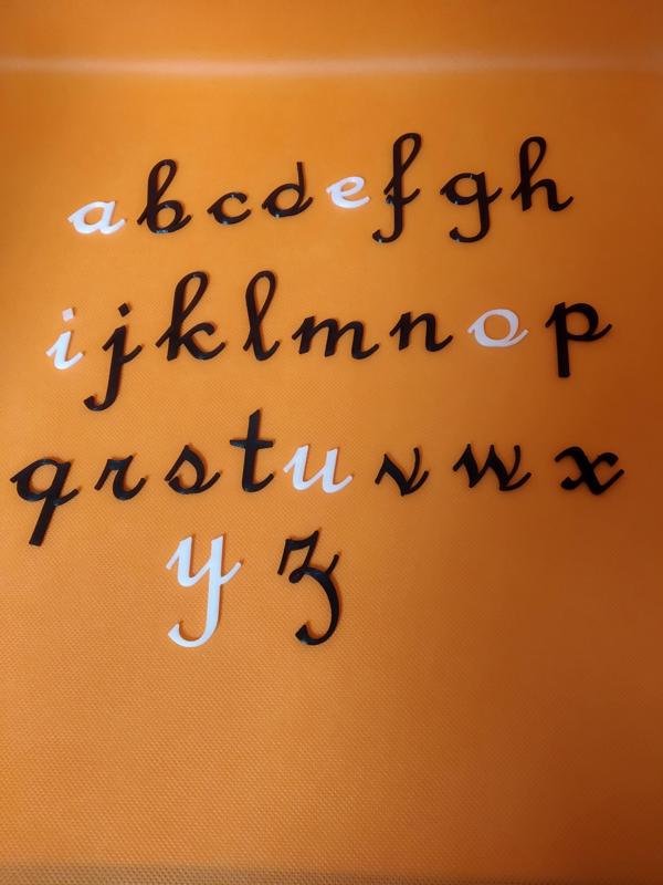 alphabet in cursive letters