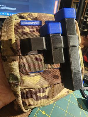 Slimline airsoft bb container and molle holder