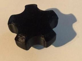 Star knob with pressed-in nut
