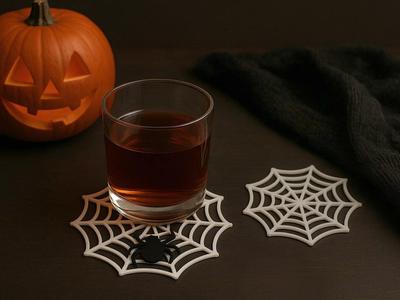 Spiderweb coaster with spider