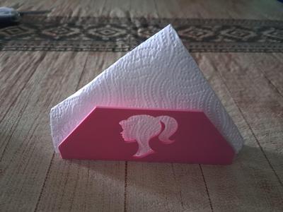 Napkin ring with Barbie's head.