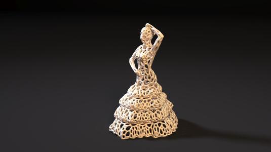 A figurine of a dancing woman