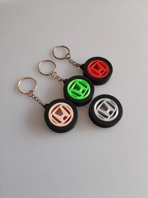 H-Gyroscope Tire Keychain – Rotating Logo