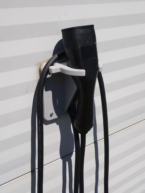 Wall hanger for Type 2 charging cable plug