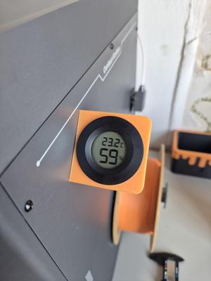 Magnetic humidity sensor holder