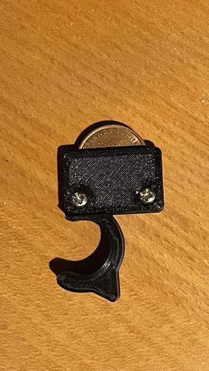 Attache pièce pour pied de caméra