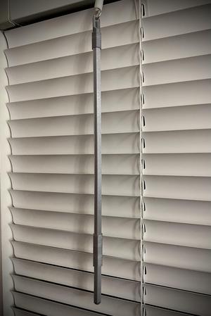 Venetian window blind rod