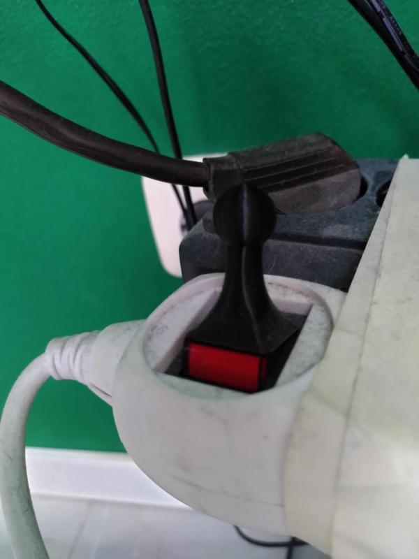 Pawn style power strip button lever 