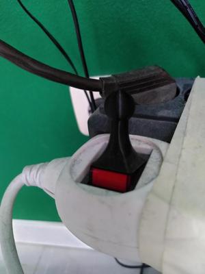 Pawn style power strip button lever 
