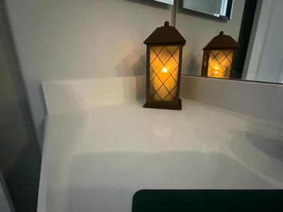 Designer lantern for battery powered candle