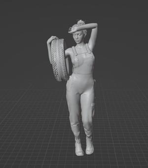Sexy Mechanic Woman Holding Tire