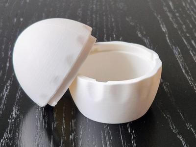 Egg-shaped container