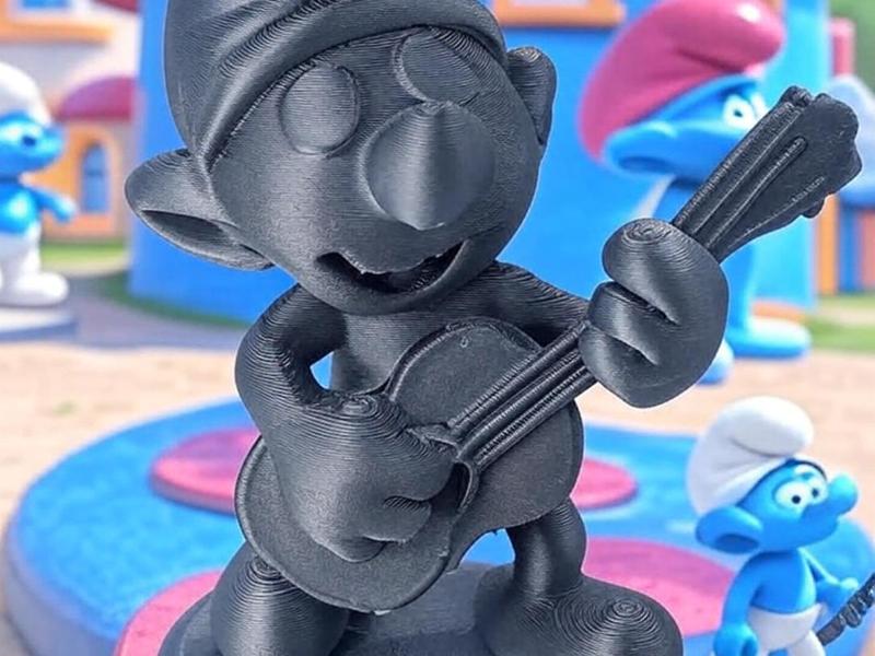 Smurf musician with guitar in concert