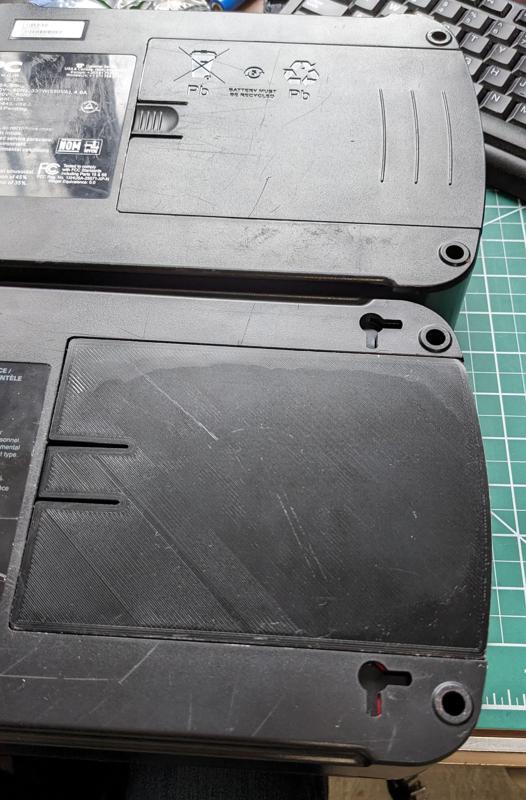 Battery cover for APC uninterruptible power supply