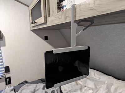 Tablet holder for trailer cabinet