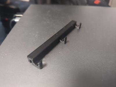 Minimalistic trash bin hanger for Ikea Skadis pegboard