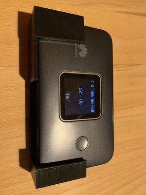 Holder for a huawei WLAN router to a wall