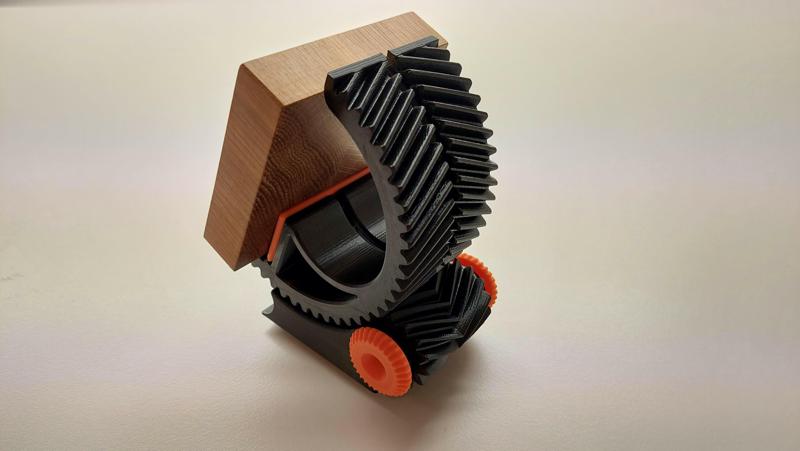 Tiltable kinetic cell phone holder