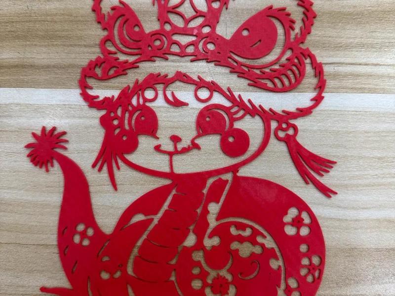 Paper-cut Window Decoration of a Writhing Dragon and a Lion Dance