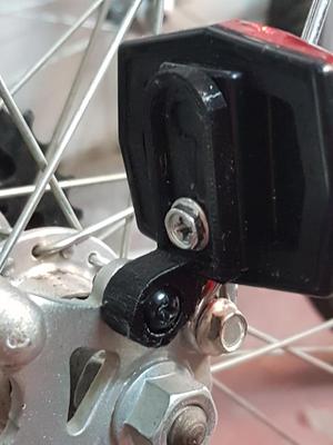 Bicycle reflector arm