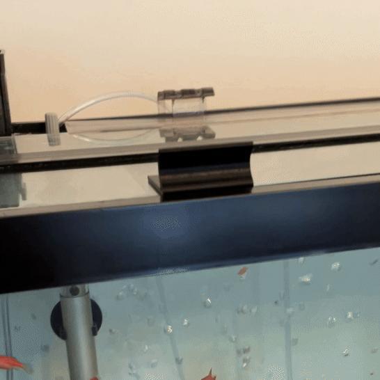 Fish tank lid handle lifter