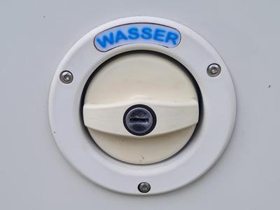 Caravan water connection emblem