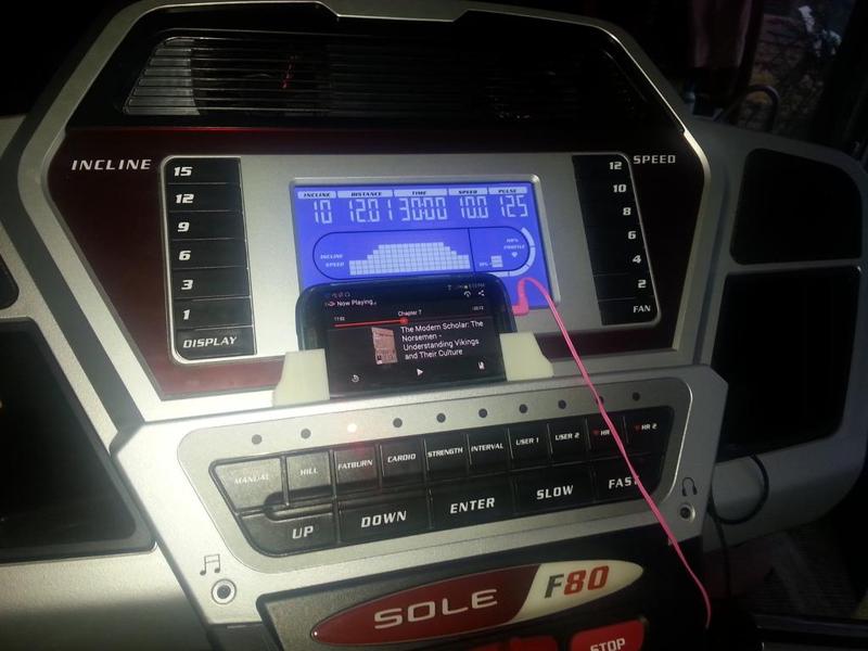 Universal treadmill phone mount