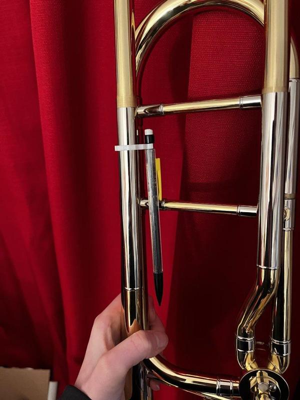 Trombone pencil holder 