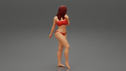 Beautiful Woman In Bikini Posing On Beach