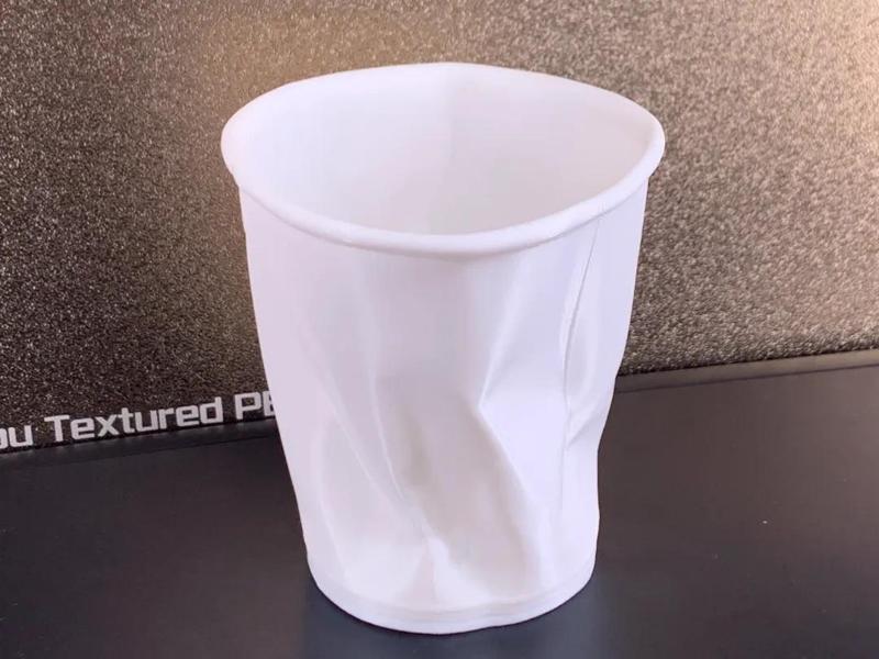 A crumpled paper cup