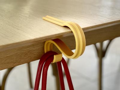 CURVE bag hanger
