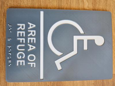 Accessible refuge area Braille signage