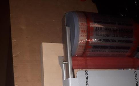 Doculabel holder for documentroll