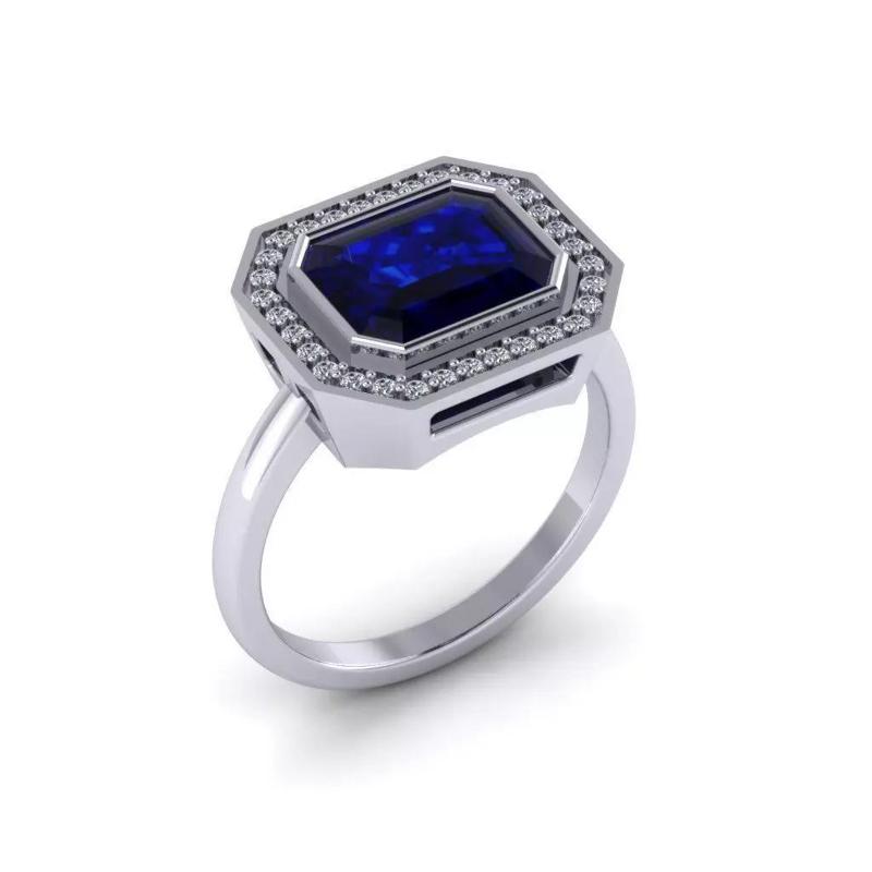 Sapphire And Diamond Halo Style Ring