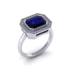 Sapphire And Diamond Halo Style Ring