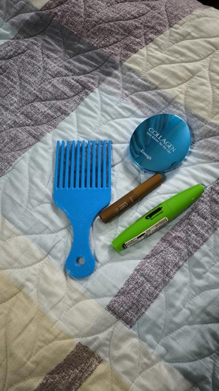 The AFROPIK comb is wonderful.