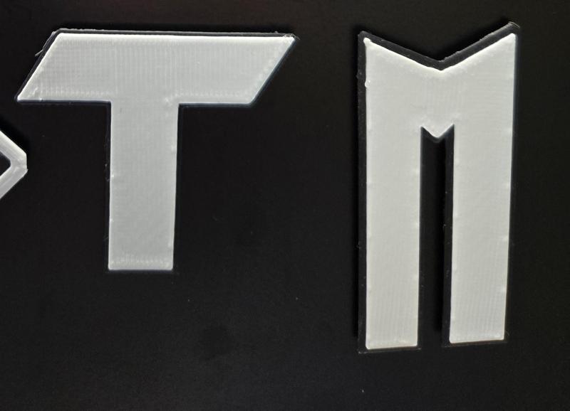Nikke Tetra and Missilis Faction Logo