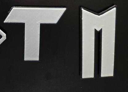 Nikke Tetra and Missilis Faction Logo