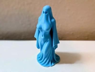 Haunting Elegance And Ghost Lady Figurine