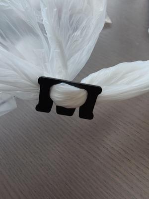 E Clip with broader sides