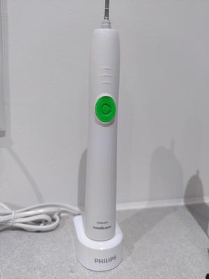Sonicare toothbrush button
