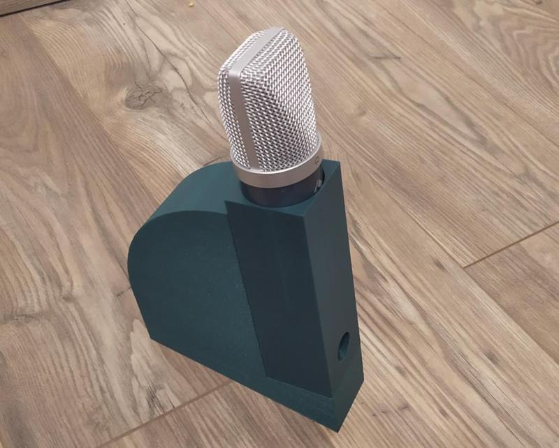 Customizable mic holder and console combo with a cable exhaust