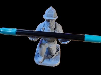 Service Fireman Holding Pen / Pencil Sculpture