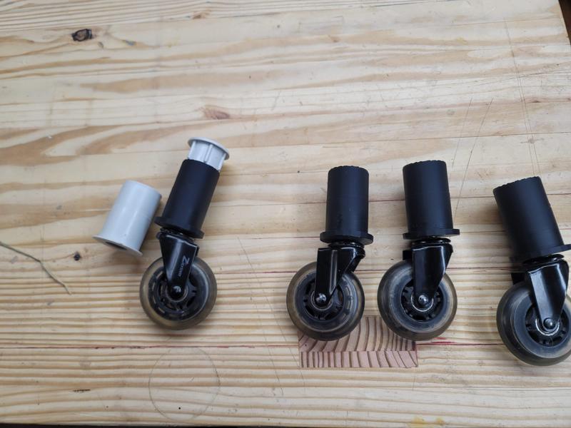 old - Roller caster support for a plastic shelf unit - old