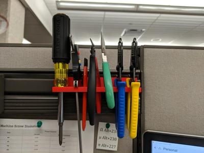 Cubicle rail tool holder