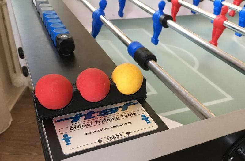 Table soccer ball holder for Garlando tables