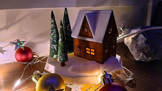 Winter house with light