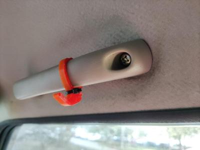 Hook for the car interior on the handle