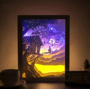 Boy sitting on tree lightbox